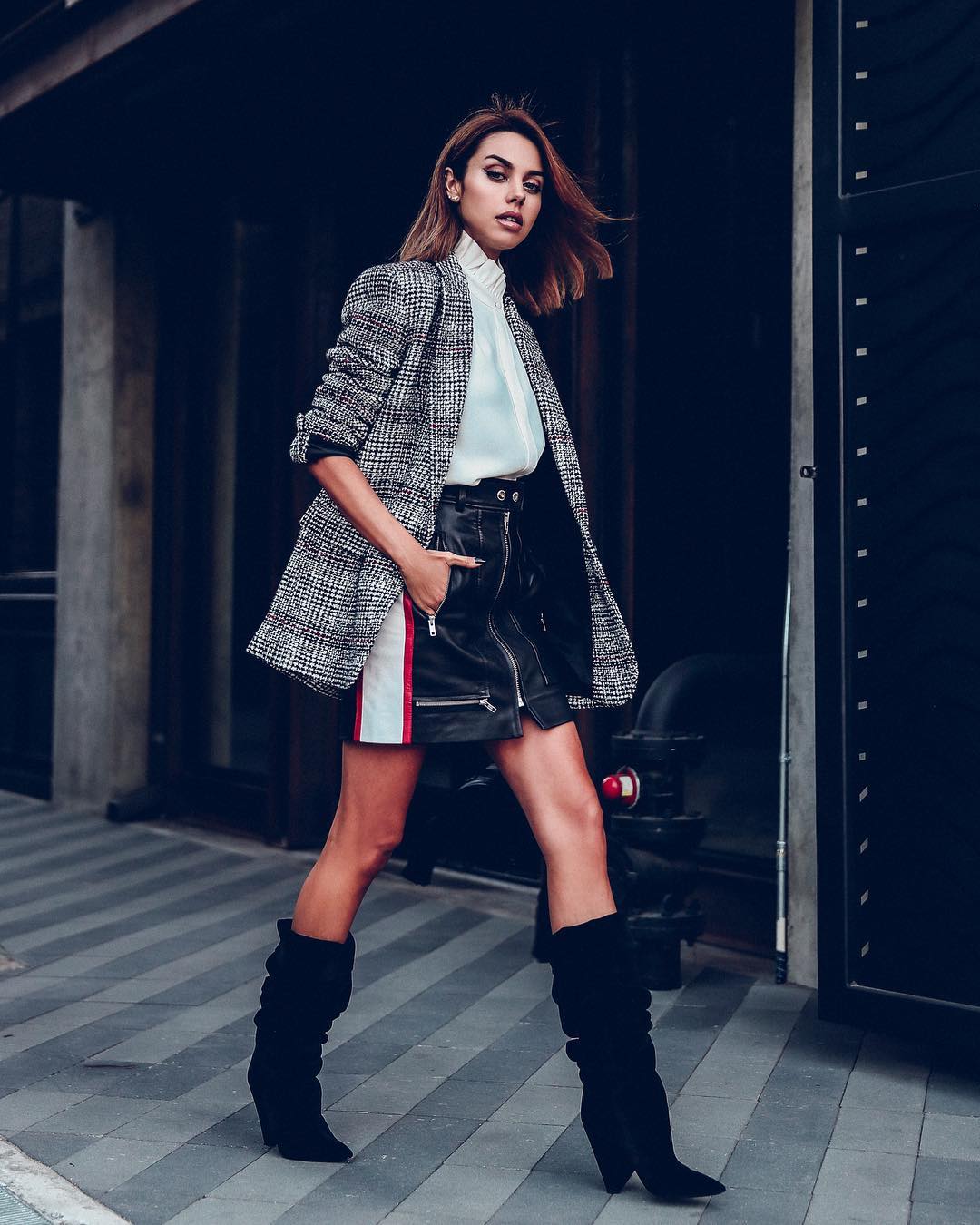 A leather skirt and check coat