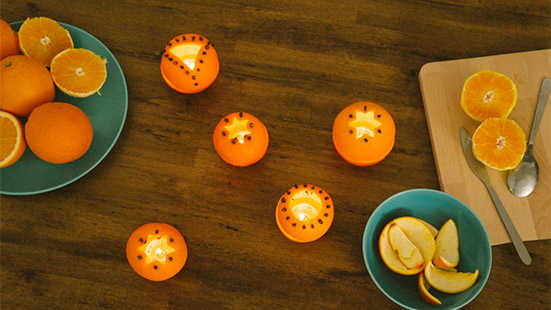 Fruit candle decoration for this Diwali